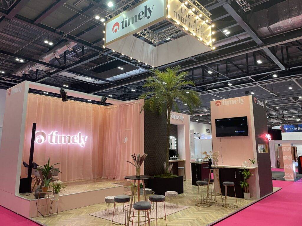 Pink walls with chairs in the centre